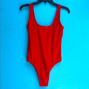 Red high cut one piece bathing suit